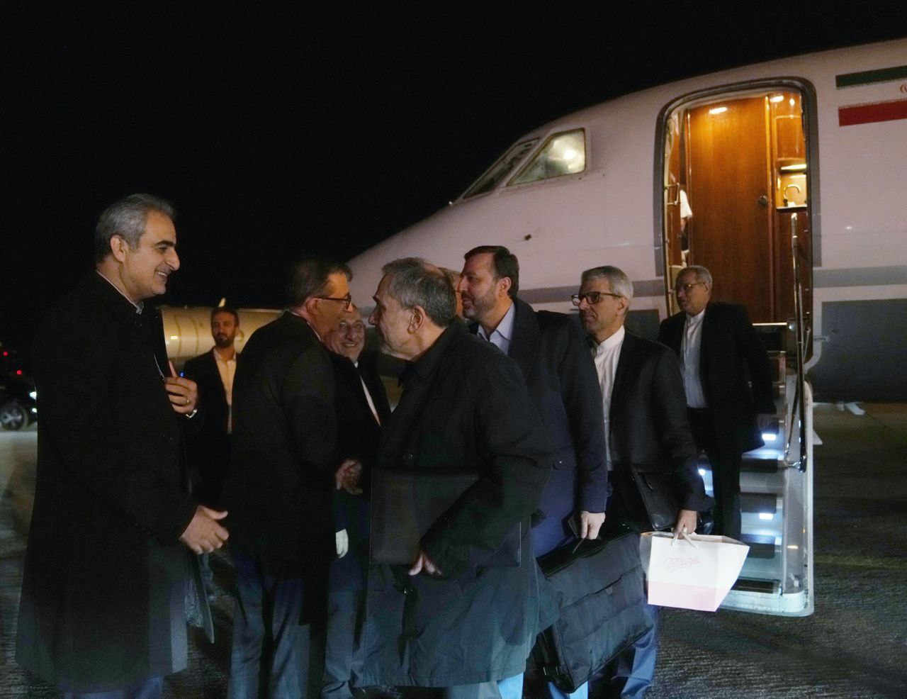  تصاویری از ورود عراقچی و هیئت همراه به ژنو