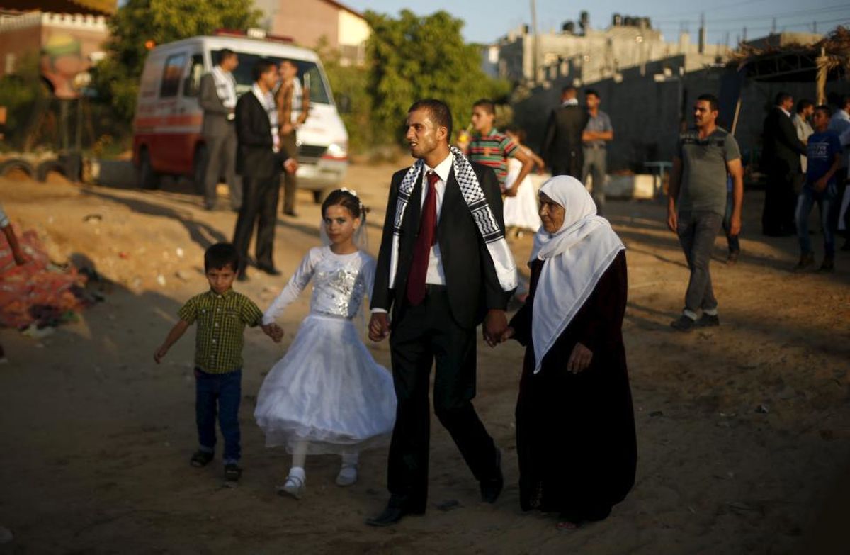 تصاویر: عروسی گروهی در نوار غزه
