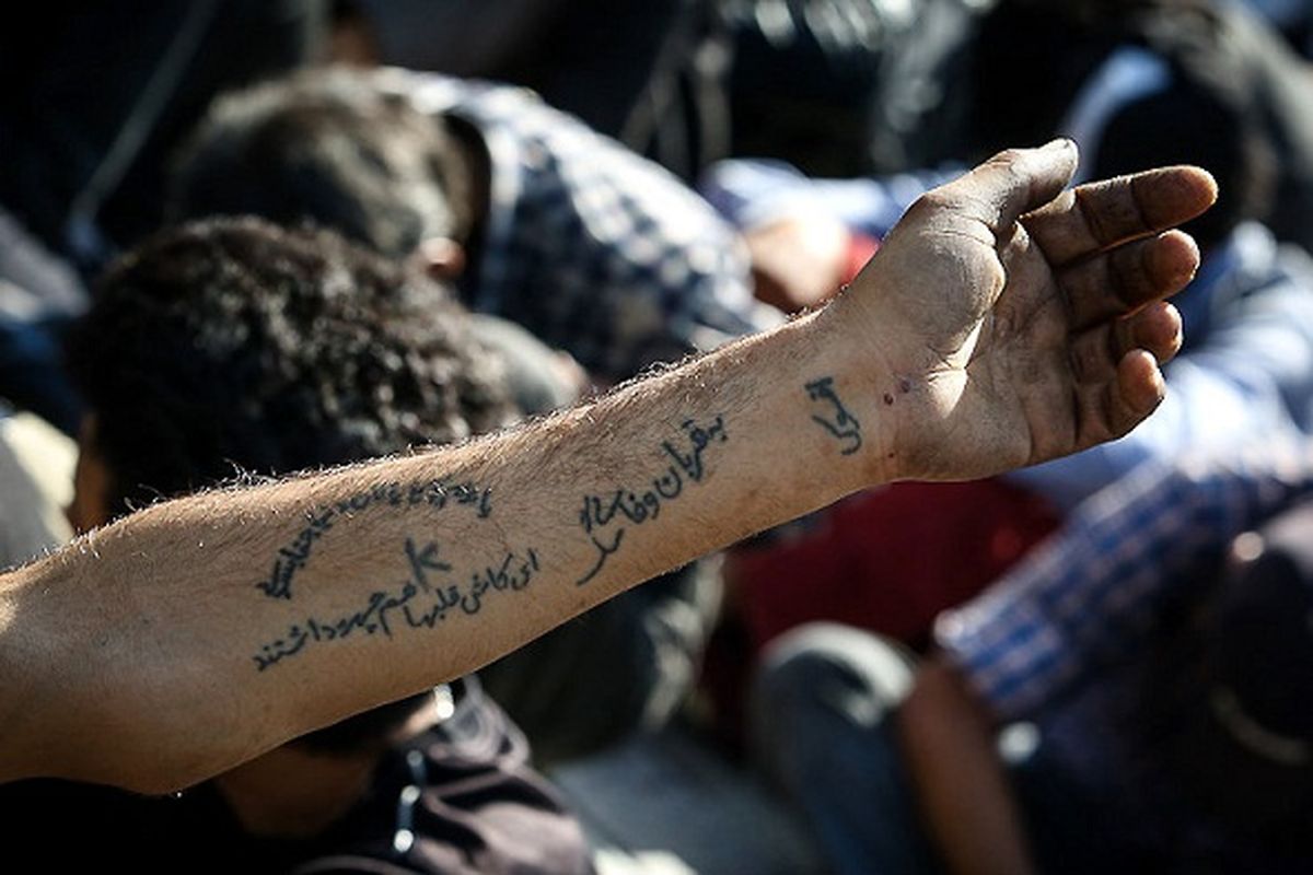 عکس/خالکوبی دست یک معتاد!