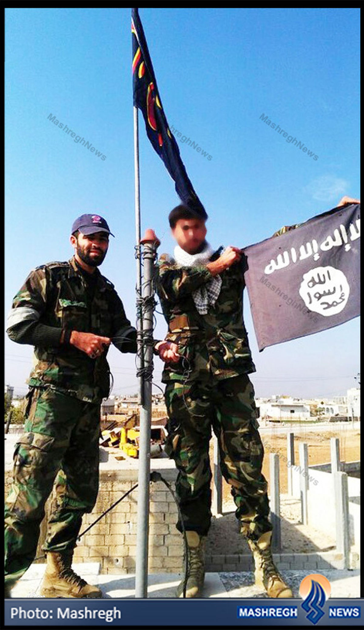 مدافع‌حرم‌پرچم‌داعش‌رابه‌زیرکشید/عکس