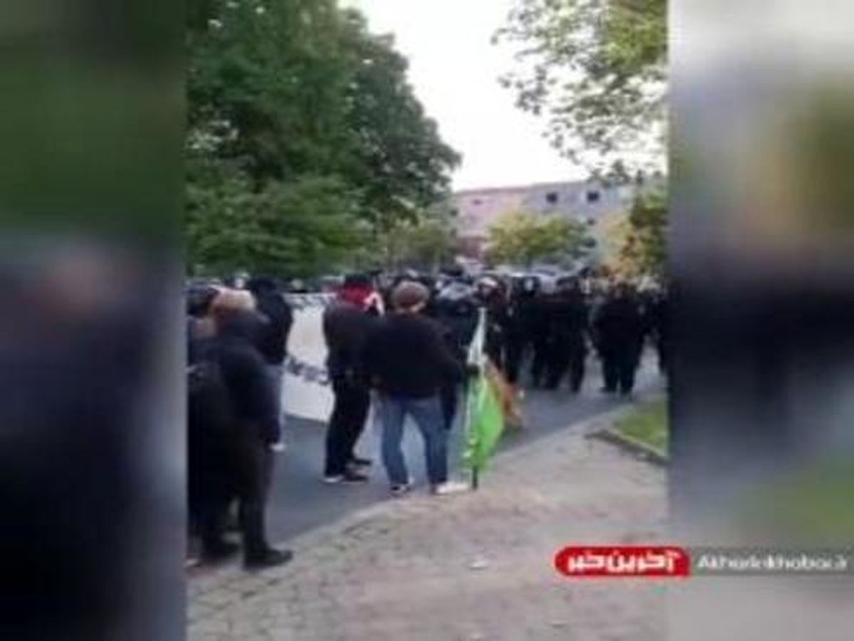 پذیرایی از معترضان با سگ و اشکآور! +فیلم