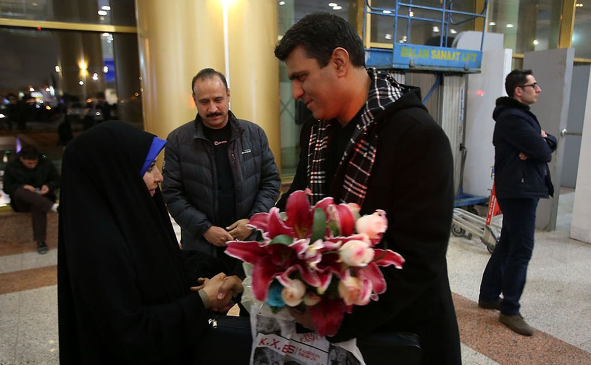 استقبال جنجالی ترین داور ایران توسط همسرش+عکس