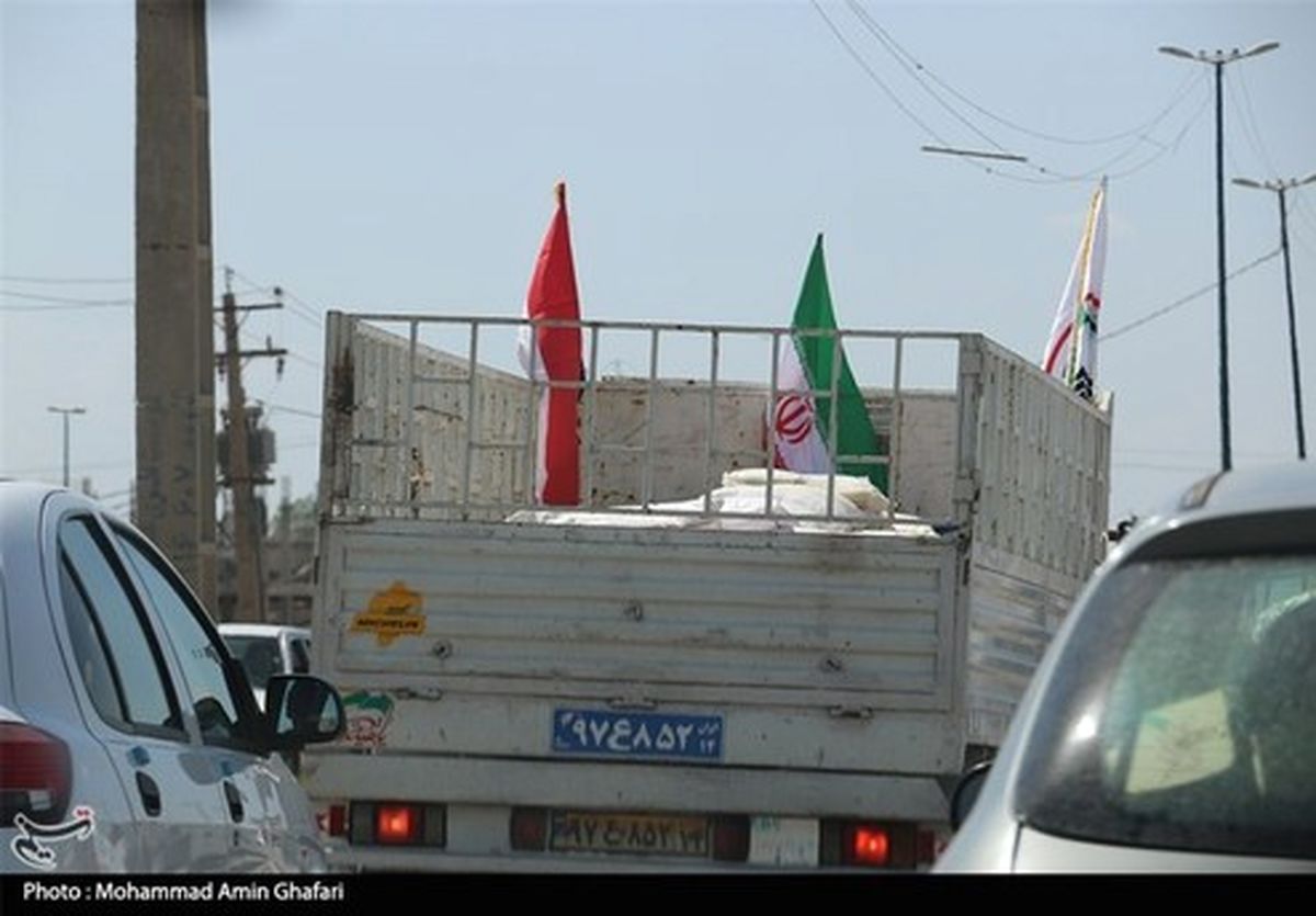 امدادرسانی نیرو‌های مردمی عراق به مناطق سیل‌زده +تصاویر