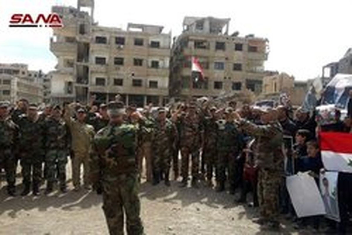 اهتزاز پرچم سوریه در «عین ترما» غوطه شرقی دمشق